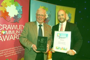 John Nolan accepts the award for Culture from Leader of the Council Cllr Peter Lamb